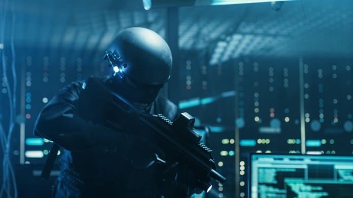 Soldier in a tech-oriented room